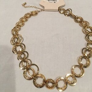 Kim Rogers gold costume necklace with linked hoop